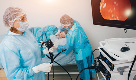 Gastroenterologist performing a colon examination using an endoscope